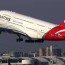 qantas cuts almost a quarter of its