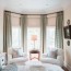 hang curtains in a bay window decor
