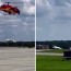 pilot jumps or falls out of plane to