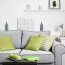 four sage green and grey living room