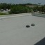 maintain roof drains on flat roofs