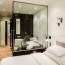 a bathtub in a bedroom 25 creative