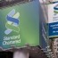 standard chartered set to axe jobs in