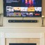 tv above a fireplace without studs