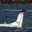 light plane crash lands in sea off tel