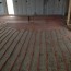 concrete over a plywood subfloor with