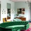 lush green velvet sofas in cozy living