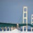 mackinac bridge shines over icy straits