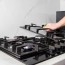 how to clean cast iron cooktop grates