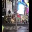 man glides around times square on drone