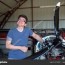 man repairing airplane engine small