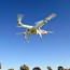 recharge drones in mid flight