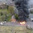 drone footage shows bus alight amid the
