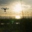 advanced drone flying at sunrise by
