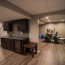 basement remodel with small bar and