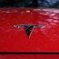 tesla says it will cut costs of next