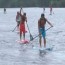 hundreds paddle board in gulfport for a