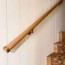 stair railing with wooden handrail and
